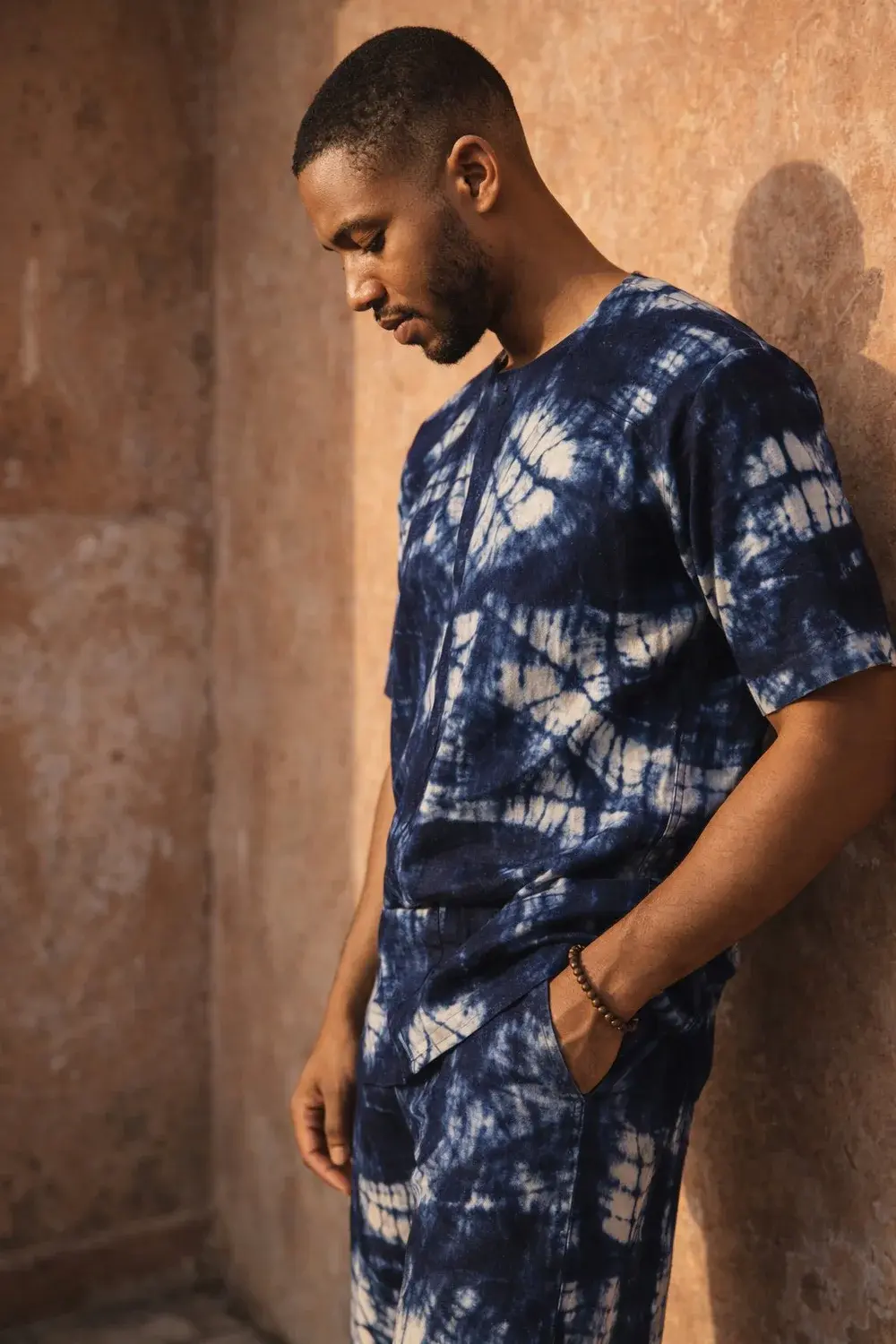 Menswear portrait in indigo patterned clothing