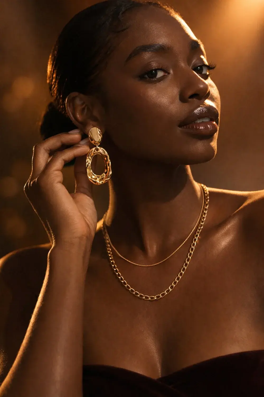 Jewellery portrait shaped with deep amber light