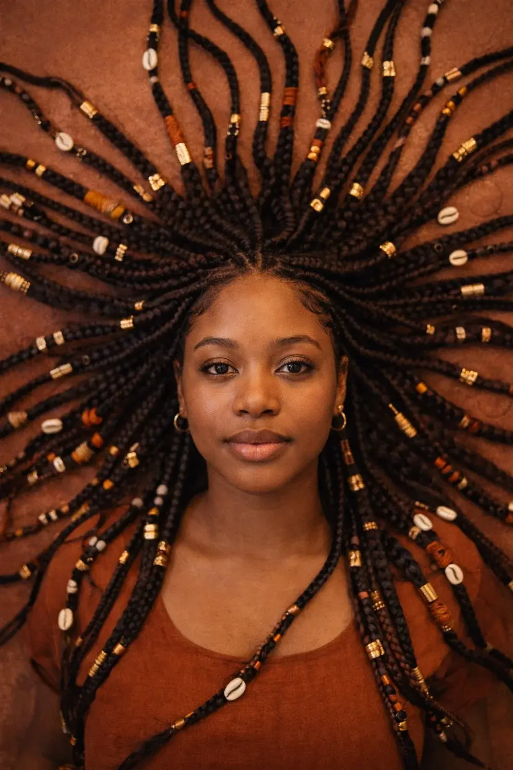 Portrait with braids arranged in a radial composition